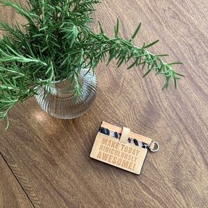 Consuela Tan and Black Card Holder